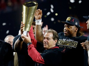 GLENDALE, AZ - JANUARY 11: Head coach Nick Saban of the Alabama Crimson Tide celebrates by hoisting the College Football Playoff National Championship Trophy after defeating the Clemson Tigers in the 2016 College Football Playoff National Championship Game at University of Phoenix Stadium on January 11, 2016 in Glendale, Arizona. The Crimson Tide defeated the Tigers with a score of 45 to 40. (Photo by Sean M. Haffey/Getty Images)